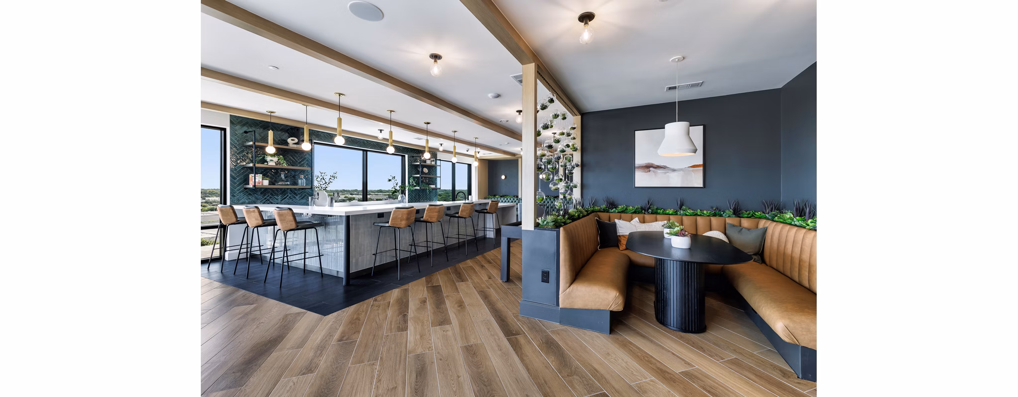 Clubhouse with contemporary design and cozy seating at DASH Downers Grove Apartments, highlighting luxury amenities for residents