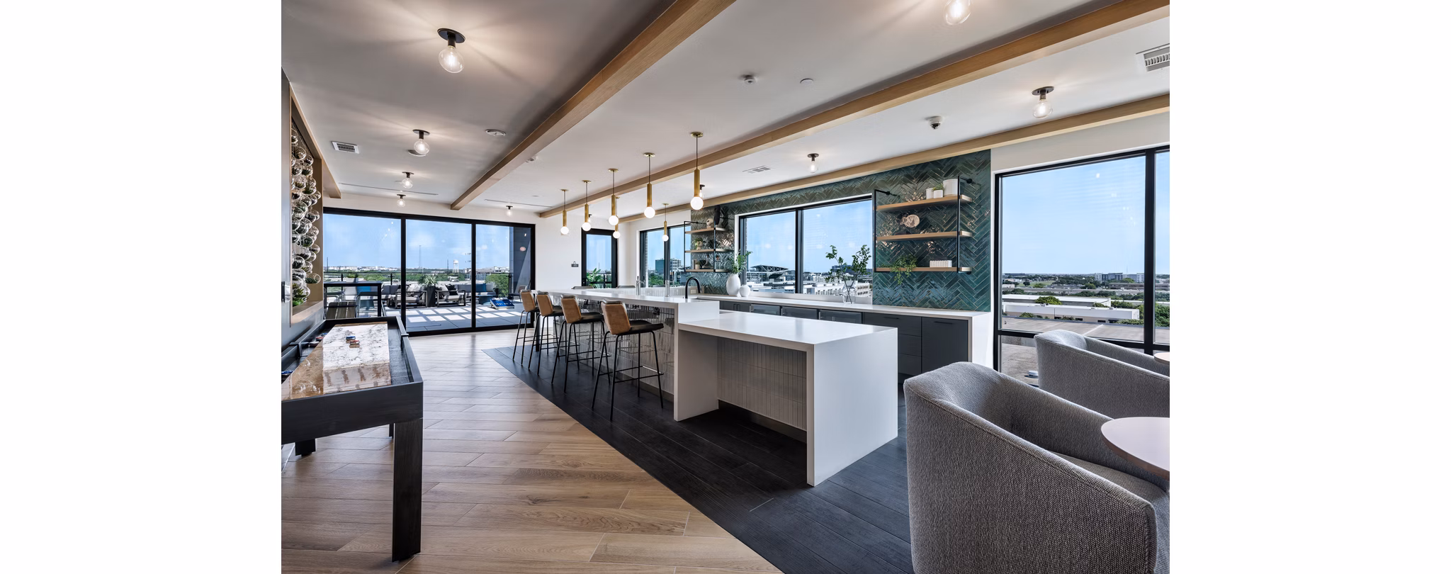 Elegant clubhouse with modern design at DASH Downers Grove Apartments featuring luxurious seating and decor
