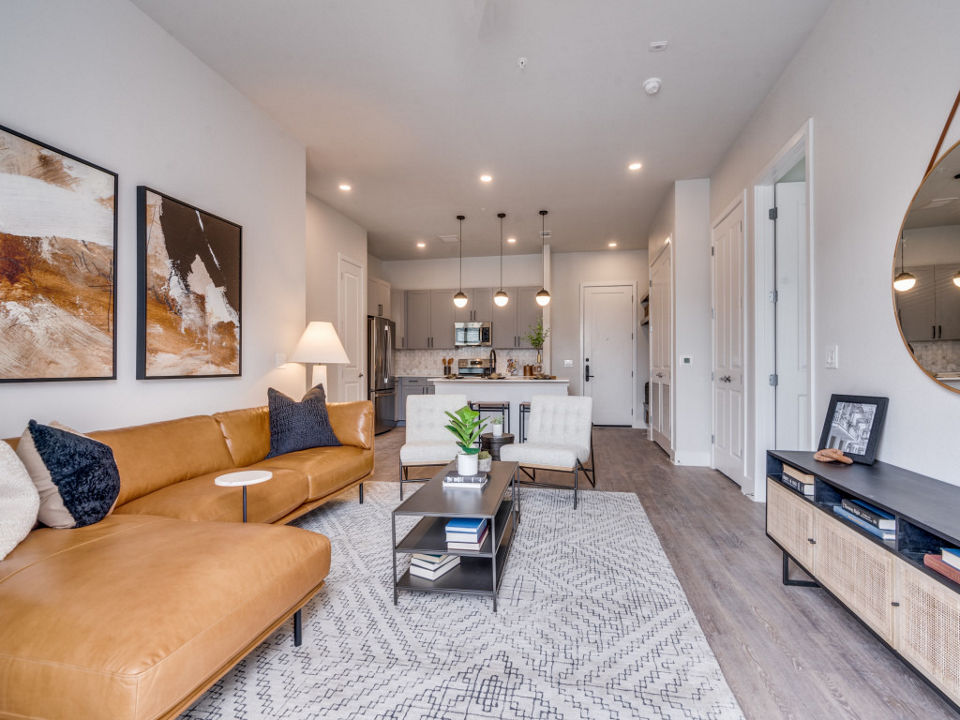 Luxurious living room with modern decor at The Met Apartments, perfect for relaxation and entertainment
