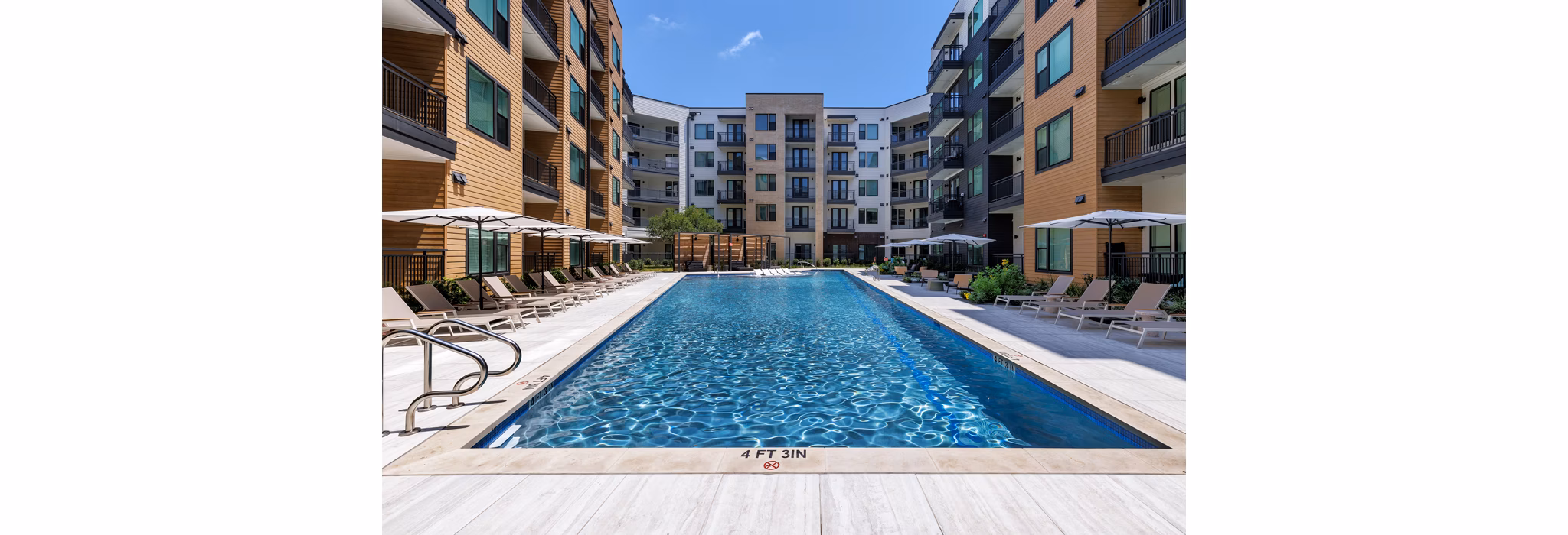 Luxurious outdoor pool at The Met Apartments