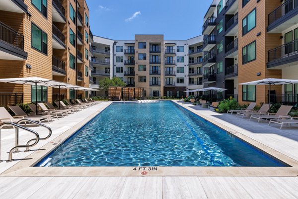 Luxurious outdoor pool at The Met Apartments