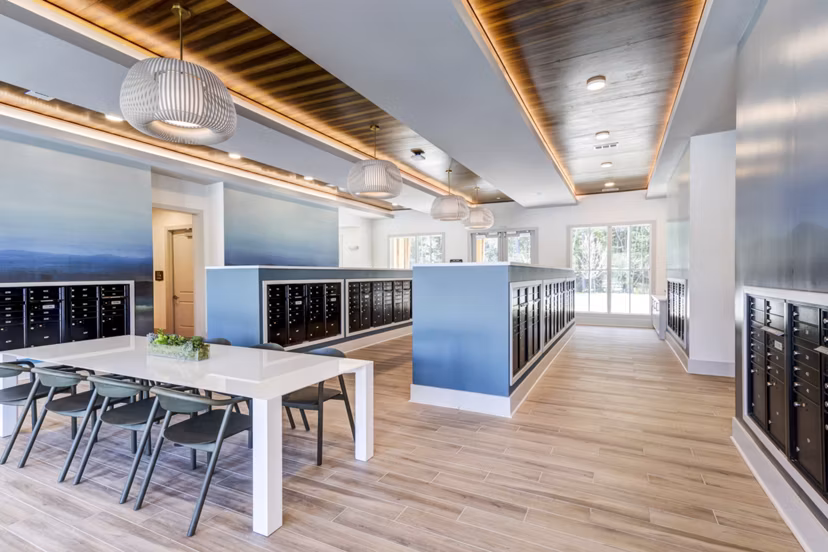 Modern mail room with secure package lockers at Marion Lake Apartments
