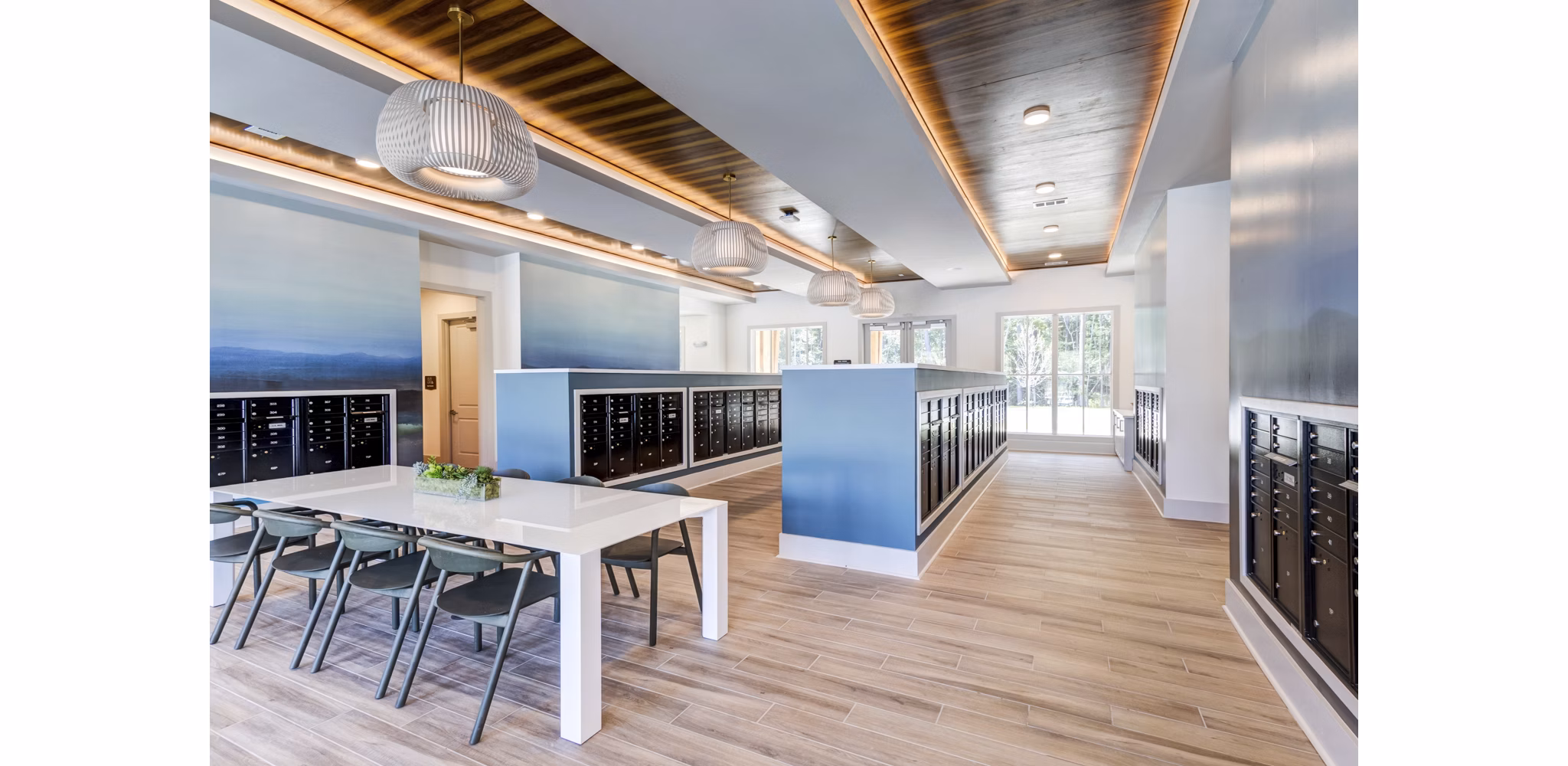 Modern mail room with secure package lockers at Marion Lake Apartments