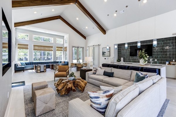 Clubhouse with modern seating and pool table at Marion Lake Apartments, perfect for social gatherings and recreational activities