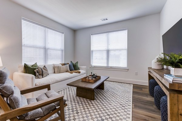 Cozy living room with modern furniture at Marion Lake Apartments