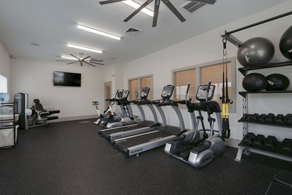 fitness center at The Grand at Carolina Forest Apartments