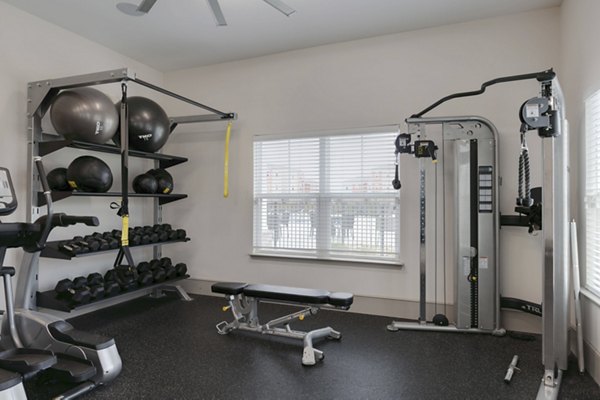 fitness center at The Grand at Carolina Forest Apartments