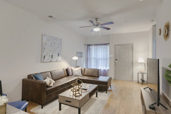 living room at The Grand at Carolina Forest Apartments