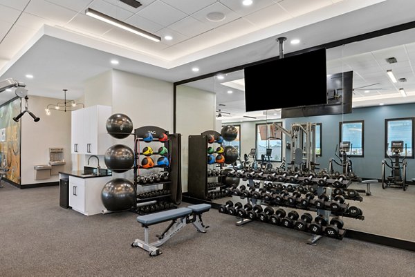 State-of-the-art fitness center with modern equipment at Encore at Tradition Apartments