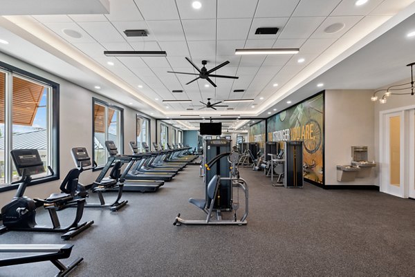 Fitness center with modern equipment at Encore at Tradition Apartments