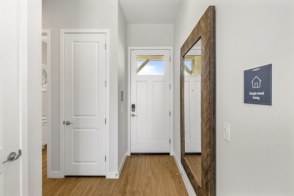 Sleek hallway with modern lighting at Yardly Paradisi Homes luxury apartments