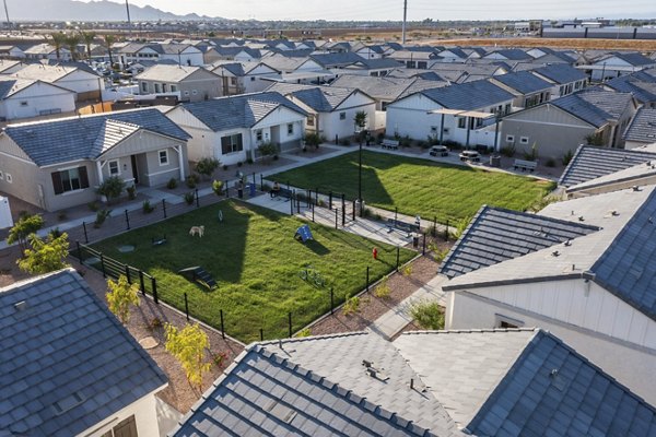 Yardly Paradisi Homes: Scenic courtyard view at luxury apartments, ideal for outdoor relaxation and community gatherings