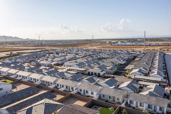 Yardly Paradisi Homes: Scenic view from luxury apartment balcony highlighting lush landscape