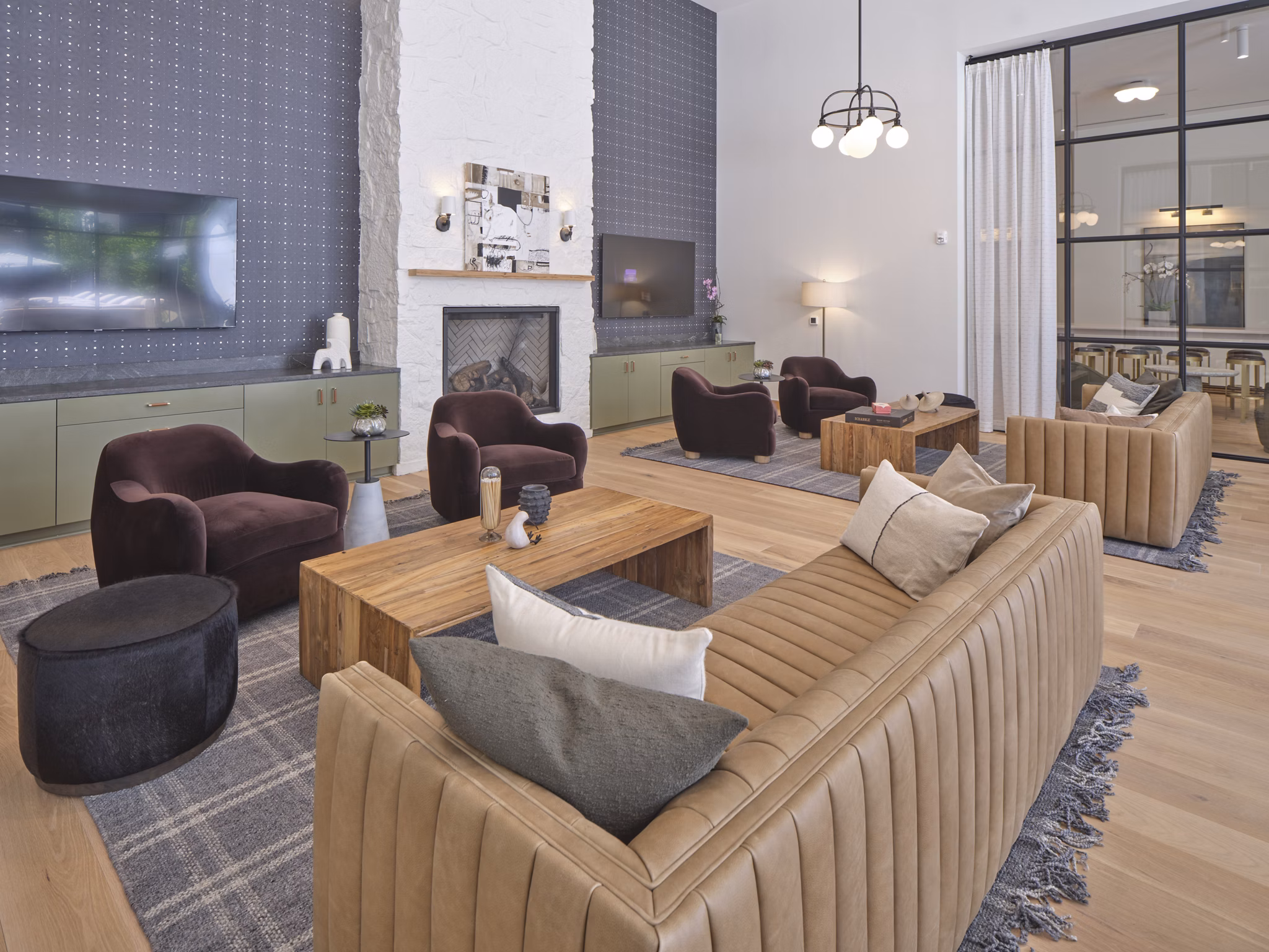 Clubhouse with modern design and elegant seating at The Eden at Lakeview Apartments