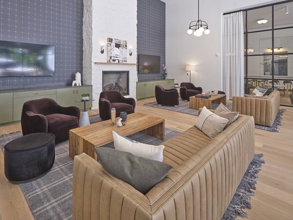 Clubhouse with modern design and elegant seating at The Eden at Lakeview Apartments