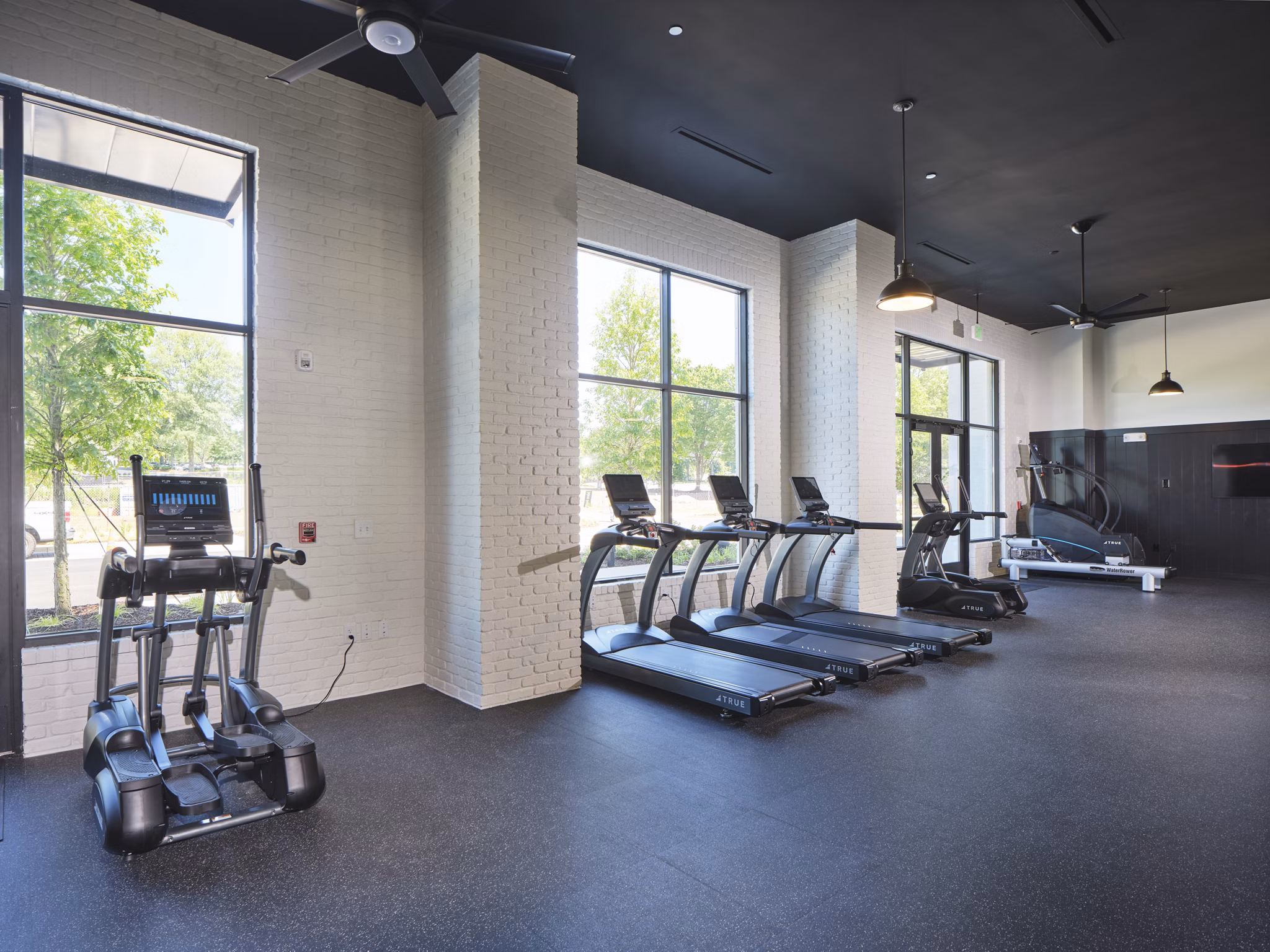 State-of-the-art fitness center at The Eden at Lakeview Apartments featuring modern equipment and spacious workout areas