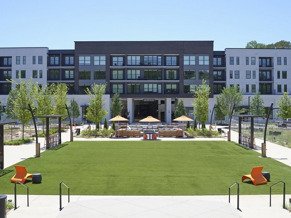 Eden at Lakeview Apartments: Beautifully landscaped courtyard with seating and walking paths