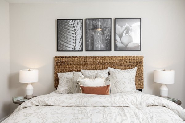 Modern bedroom with sleek furnishings at Eleve Apartments, offering luxury living in the heart of the city