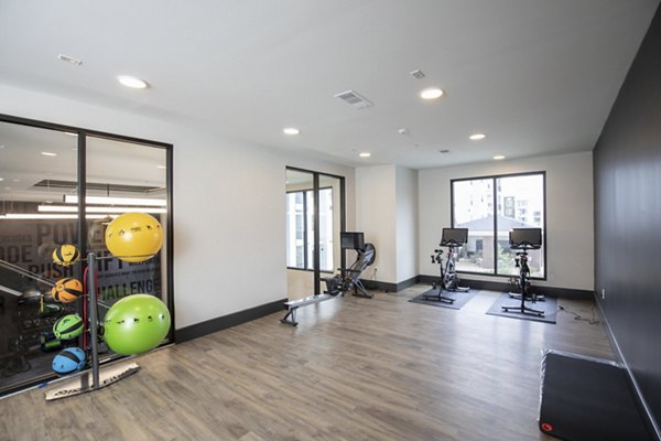 fitness center at Eleve Apartments