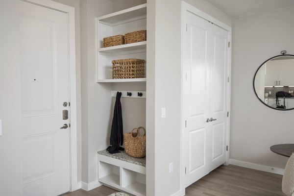 Stylish entryway with modern decor at Eleve Apartments