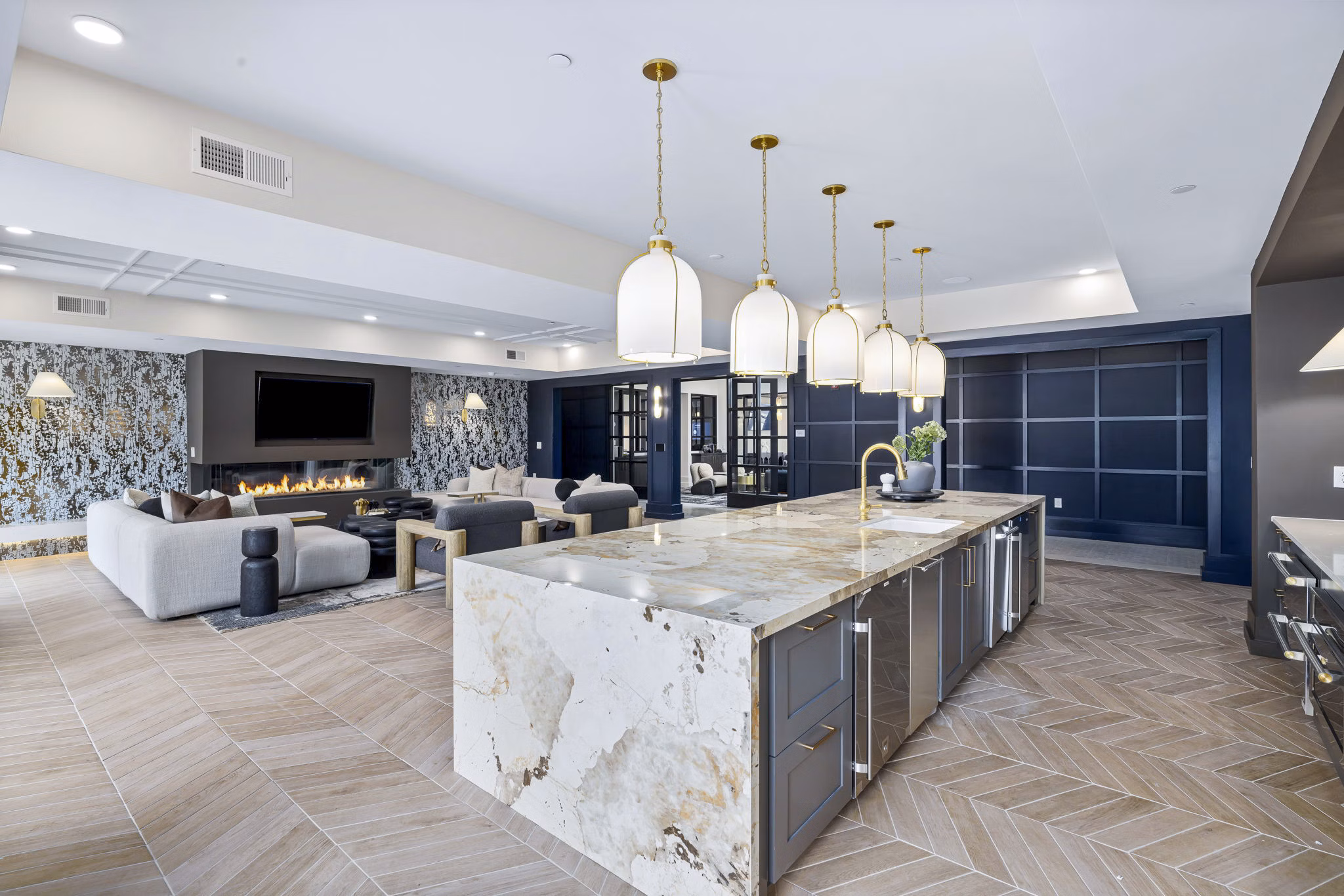 Clubhouse lobby with modern furnishings at The Keaton at Brier Creek Apartments, featuring luxury finishes and comfortable seating areas