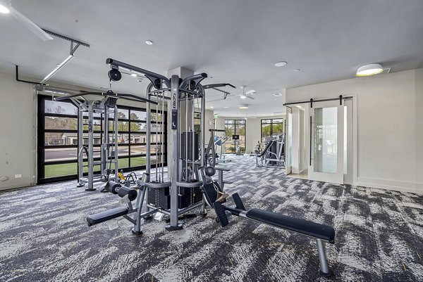 Modern fitness center with state-of-the-art equipment at The Keaton at Brier Creek Apartments