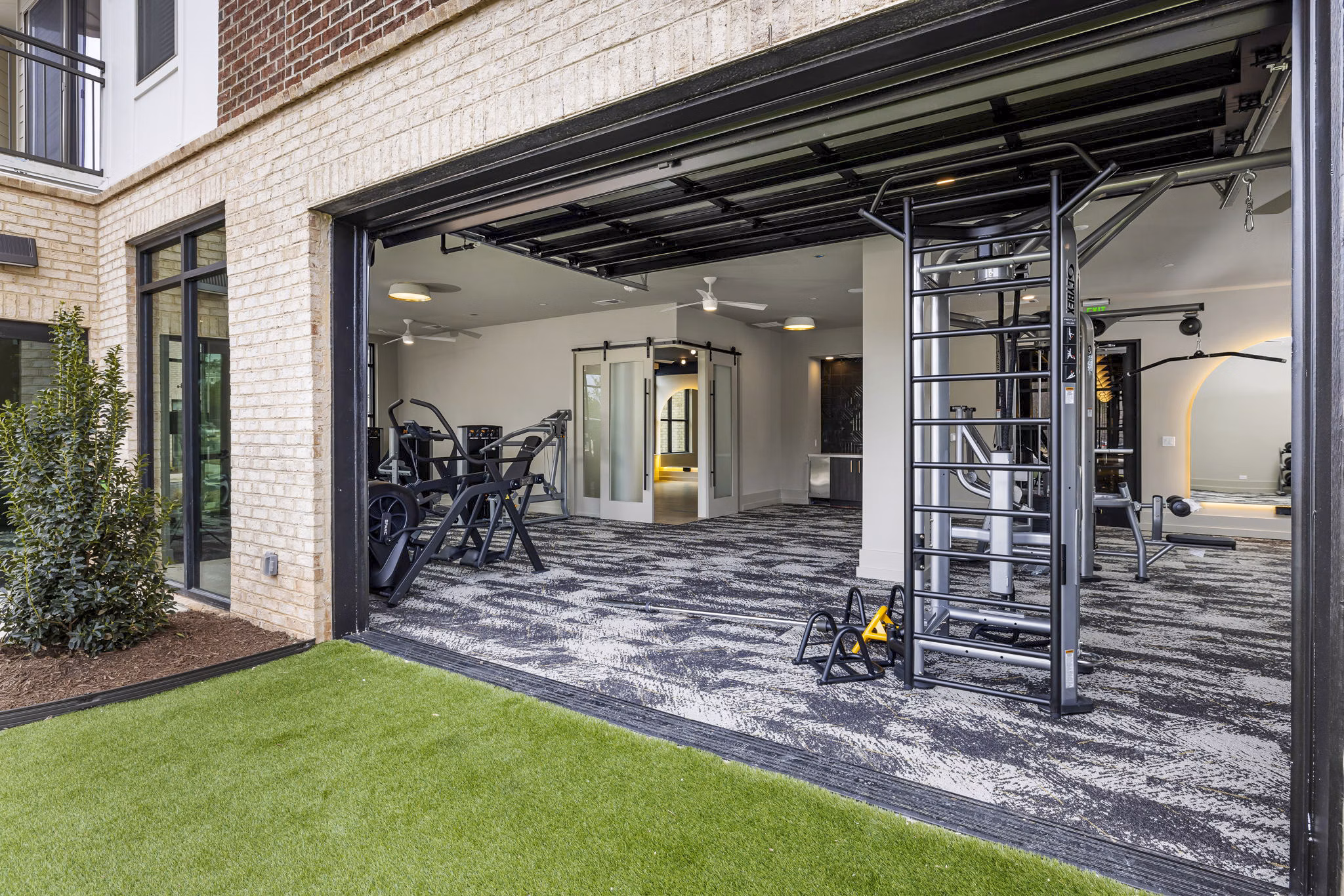 Fully-equipped fitness center with modern machines at The Keaton at Brier Creek Apartments, ideal for residents seeking an active lifestyle