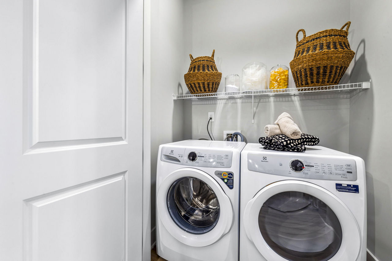 Laundry room at The Keaton At Brier Creek Apartments