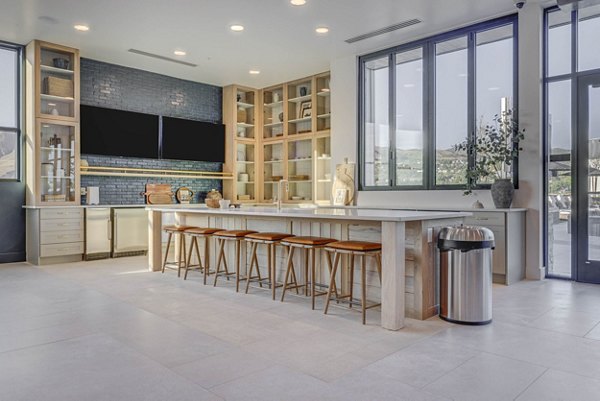 Stylish clubhouse with cozy seating and modern decor at Camber Apartments