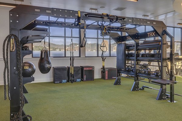 State-of-the-art fitness center with modern equipment at Camber Apartments, offering a luxurious workout space for residents