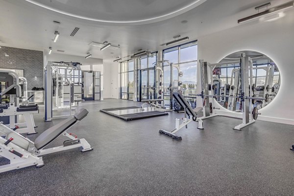 Fitness center with modern equipment at Camber Apartments, offering residents a state-of-the-art workout experience