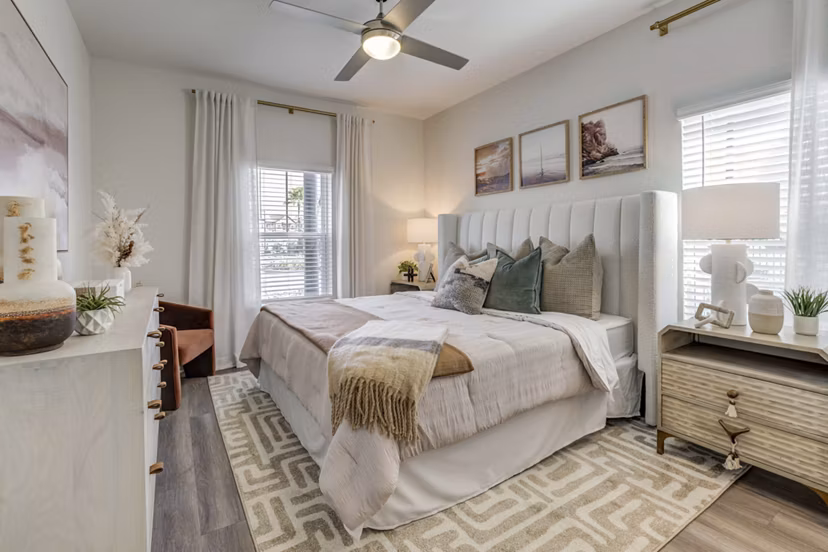 Cozy bedroom with modern decor at Alton Serenoa Apartments