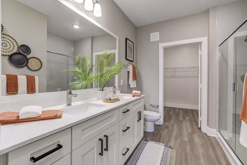 Luxurious bathroom with modern fixtures at Alton Serenoa Apartments