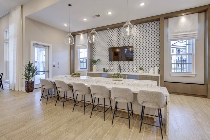 Stylish clubhouse with modern furnishings at Alton Serenoa Apartments