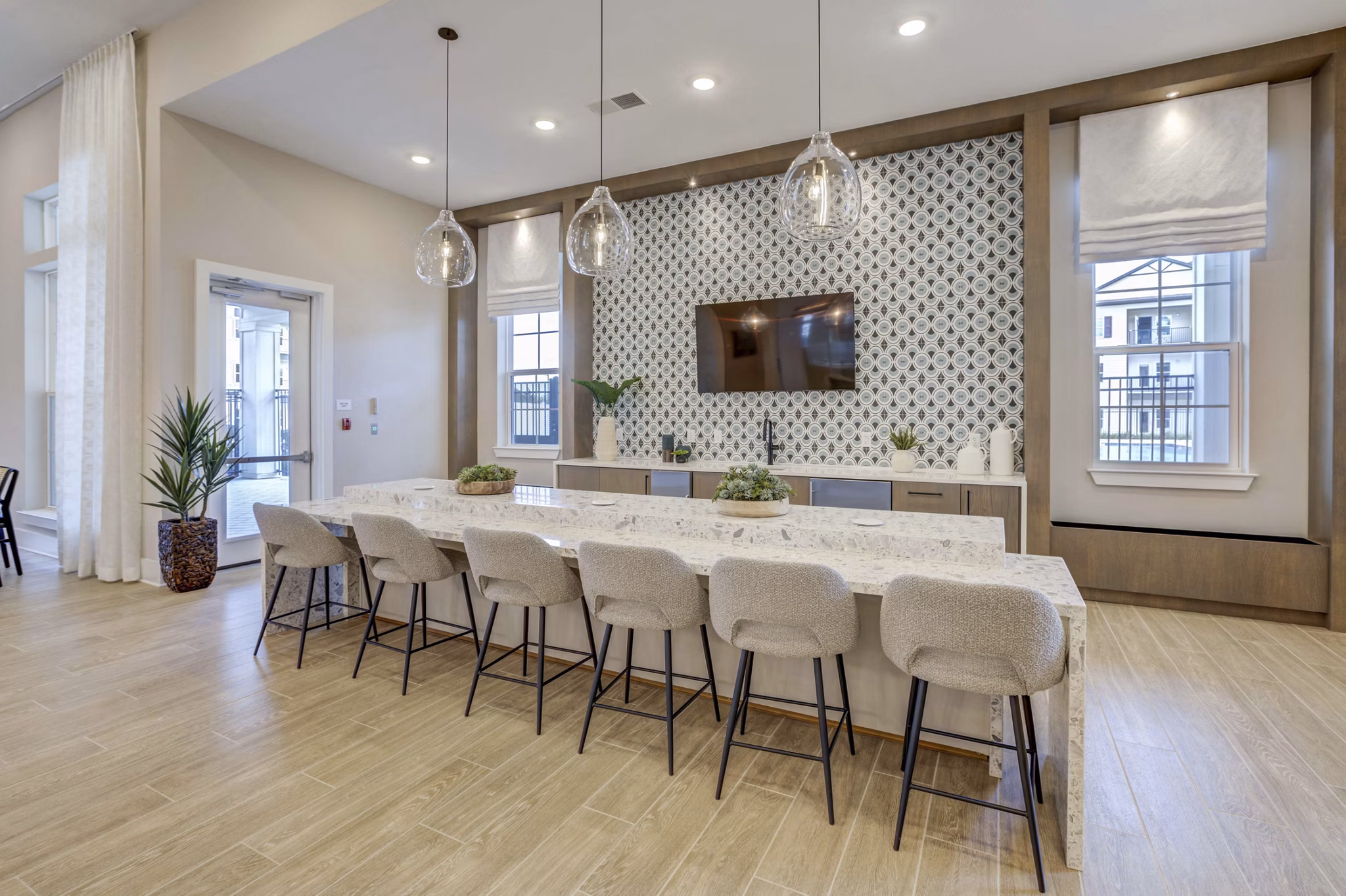 Stylish clubhouse with modern furnishings at Alton Serenoa Apartments