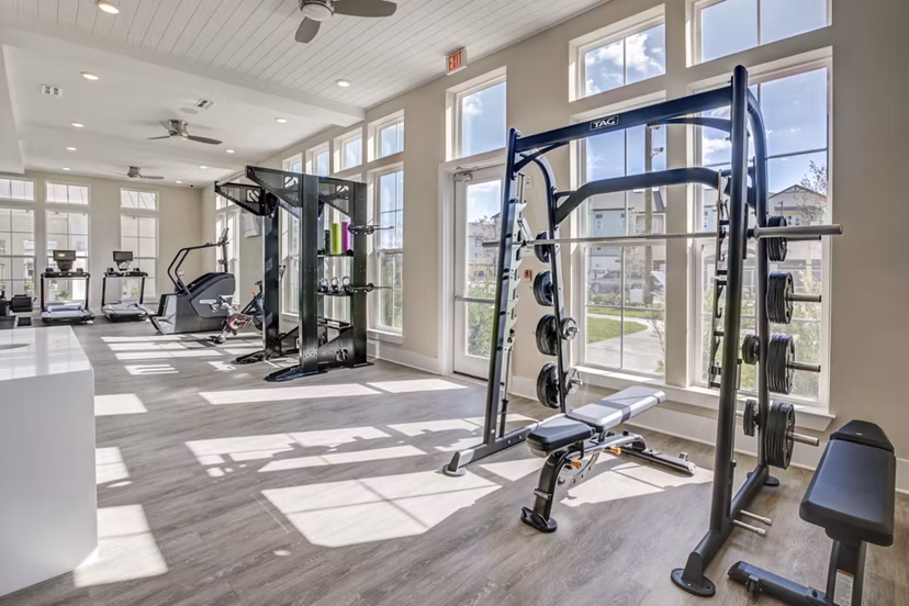 Modern fitness center with state-of-the-art equipment at Alton Serenoa Apartments