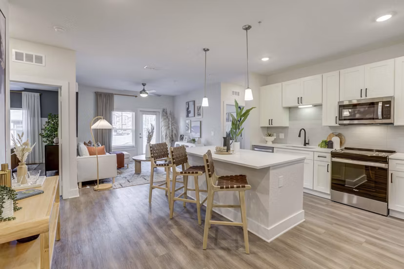 Modern kitchen with stainless steel appliances at Alton Serenoa Apartments