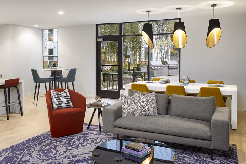 Elegant clubhouse with modern furnishings at Atworth Apartments, a Greystar luxury community
