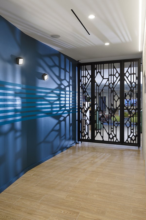 Clubhouse featuring modern design and comfortable seating at Atworth Apartments