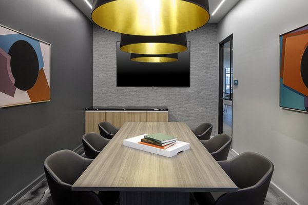 Meeting facility with modern furnishings and AV equipment at Atworth Apartments