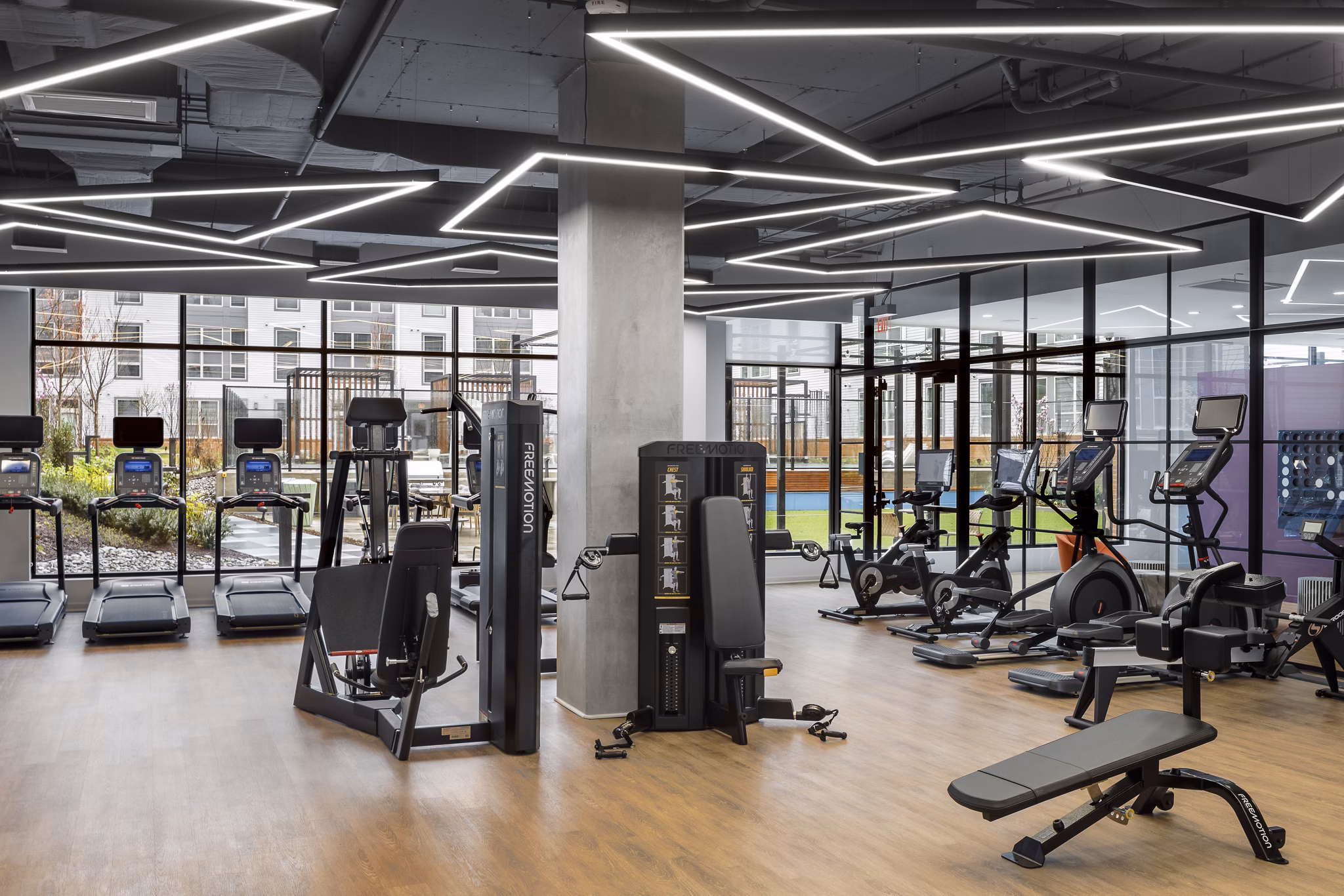 Modern fitness center with state-of-the-art equipment at Atworth Apartments for an active lifestyle