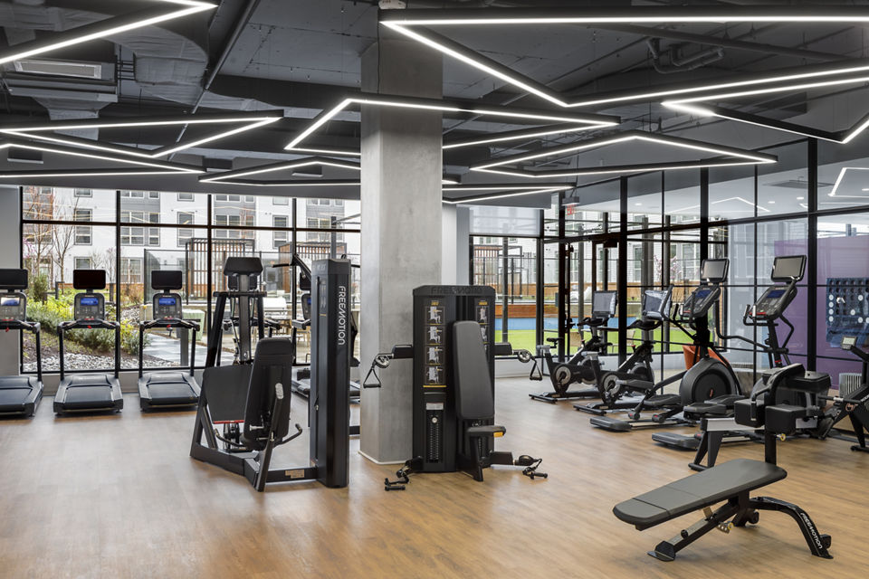 Modern fitness center with state-of-the-art equipment at Atworth Apartments for an active lifestyle