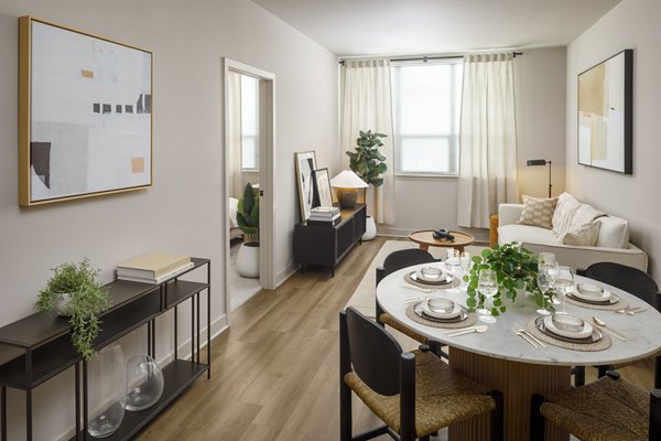 Elegant dining area with sleek furnishings at Atworth Apartments