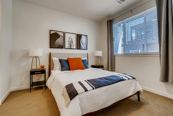 Cozy bedroom with modern decor at Legacy at Fitz Apartments