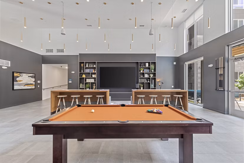 Clubhouse with elegant design and modern furnishings at Legacy at Fitz Apartments, offering luxury living spaces