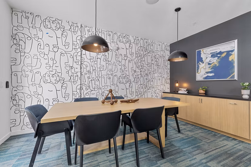 Clubhouse with modern design and cozy seating at Legacy at Fitz Apartments, offering a luxurious community experience