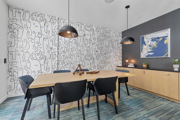 Clubhouse with modern design and cozy seating at Legacy at Fitz Apartments, offering a luxurious community experience
