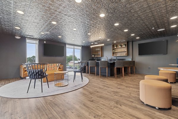 Modern clubhouse featuring stylish seating and vibrant decor at Legacy at Fitz Apartments