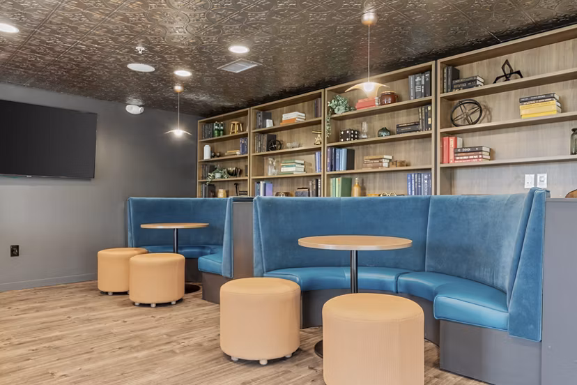 Elegant clubhouse with stylish seating and modern decor at Legacy at Fitz Apartments, ideal for gatherings and relaxation