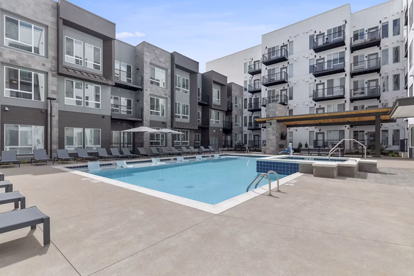 Resort-style pool at Legacy at Fitz Apartments, offering luxurious relaxation and a serene ambiance